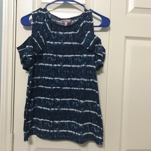 A lady’s open shoulders top in good condition